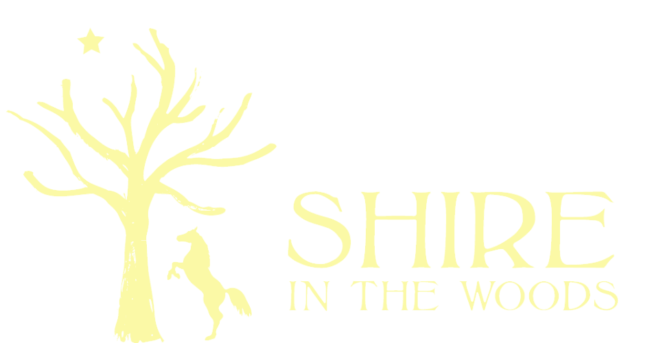The Shire in the Woods logo